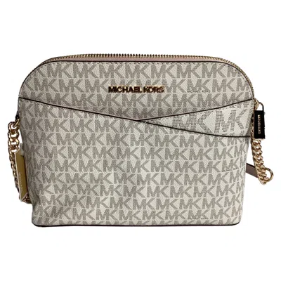 Michael Kors Jet Set Crossbody Bag In Cream Canvas