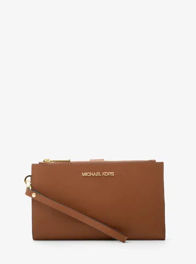Michael Kors Jet Set Large Leather Smartphone Wristlet Wallet In Brown