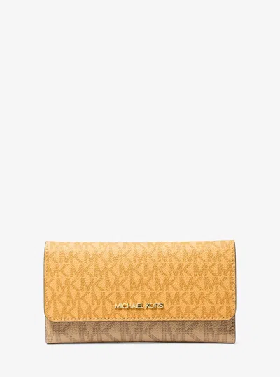 Michael Kors Jet Set Large Signature Logo Tri-fold Wallet In Yellow