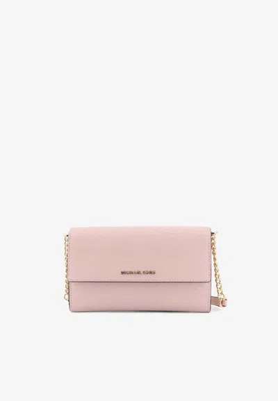 Michael Kors Jet Set Leather Crossbody Bag In Pink