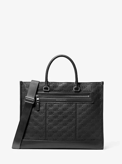 Michael Kors Jet Set Logo Embossed Leather Tote Bag In Black