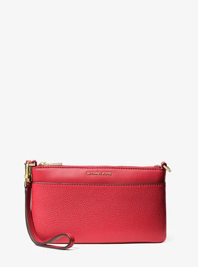 Michael Kors Jet Set Medium Pebbled Leather Wristlet In Pink