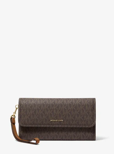 Michael Kors Jet Set Medium Signature Logo Smartphone Wristlet In Brown