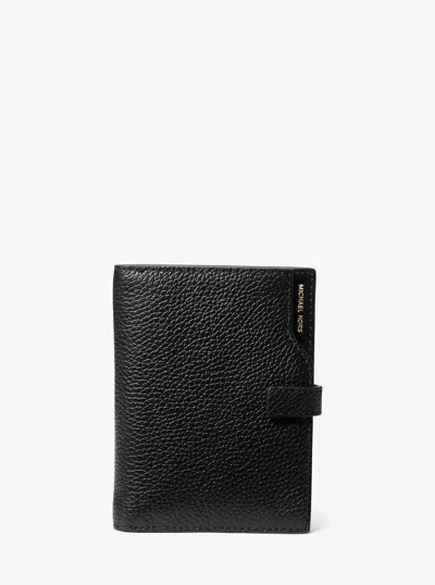 Michael Kors Jet Set Pebbled Leather Passport Wallet In Black