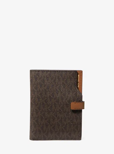Michael Kors Jet Set Signature Logo Passport Wallet In Brown