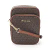 Michael Kors Jet Set Travel Brown Mk Signature Pvc Medium Flight Crossbody Bag In Brown