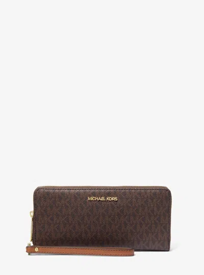 Michael Kors Jet Set Travel Large Logo Continental Wristlet In Brown