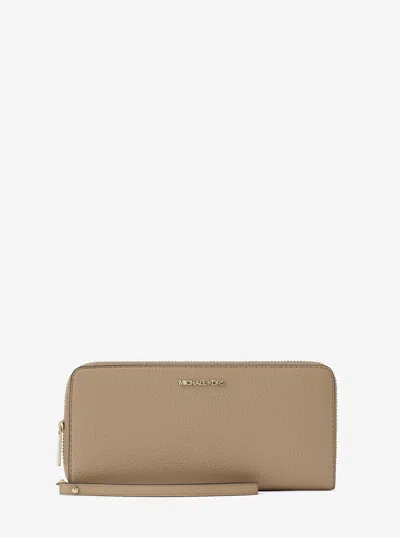 Michael Kors Jet Set Travel Large Pebbled Leather Wristlet In Brown