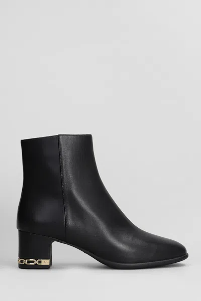 MICHAEL KORS JUNE FLEX HIGH HEELS ANKLE BOOTS IN BLACK LEATHER