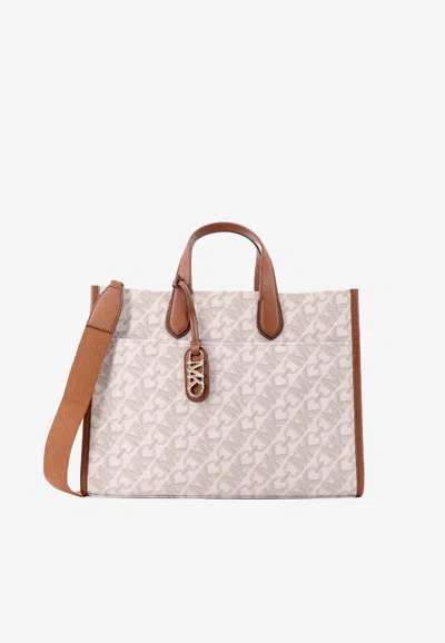 Michael Kors Large Gigi Empire Logo Print Canvas Tote Bag In Sand