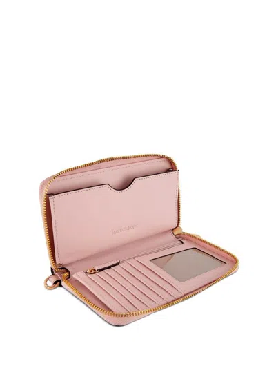 Michael Kors Leather Multifunction Travel Wallet In Pink