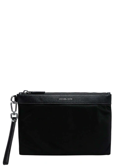 Michael Kors Logo Detailed Zipped Clutch Bag In Black