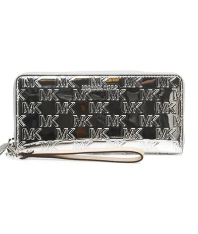 Michael Kors Logo Embossed Zipped Wallet In Silver