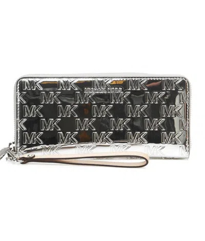 Michael Kors Logo Embossed Zipped Wallet In Metallic