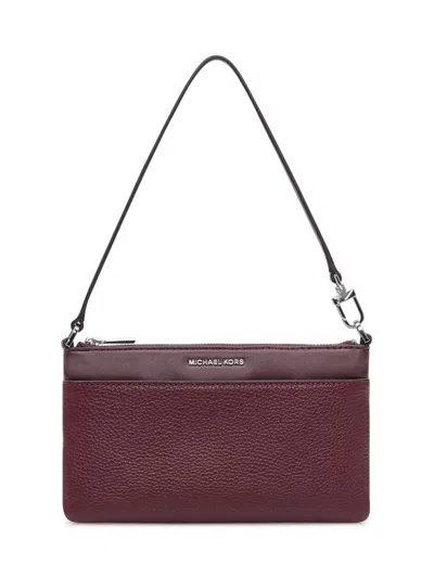 Michael Kors Wristlet In Bordeaux Hammered Leather In Red