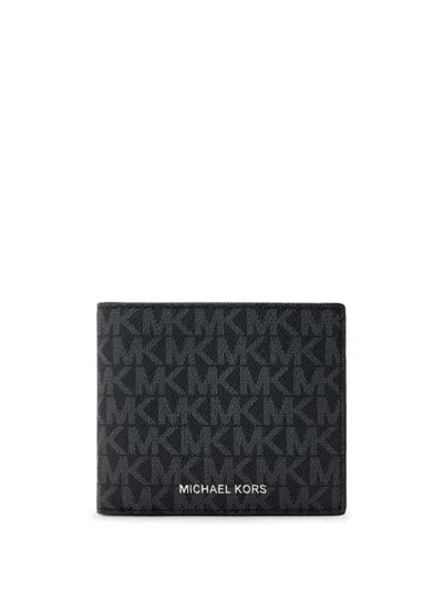 Michael Kors Monogram-jacquard Wallet In Black