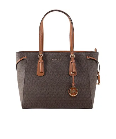 Michael Kors Monogram Print Tote In Brown