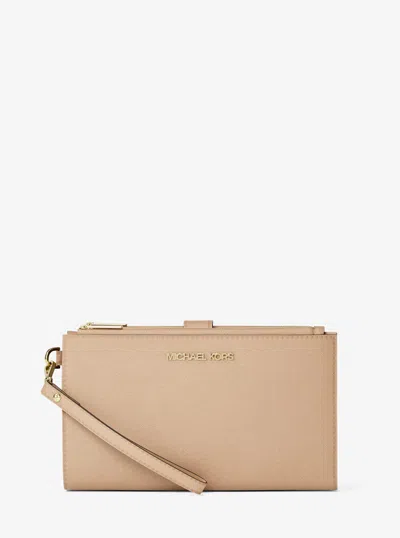 Michael Kors Outlet Jet Set Large Leather Smartphone Wristlet Wallet In Brown