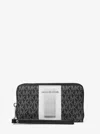 Michael Kors Outlet Jet Set Large Metallic Signature Logo Stripe Smartphone Wallet In Black