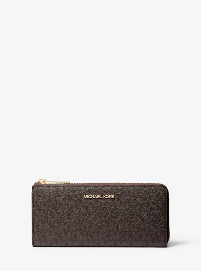Michael Kors Outlet Jet Set Travel Large Logo Quarter-zip Wallet In Brown