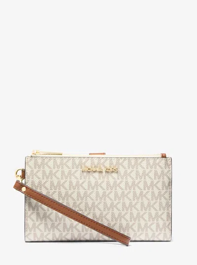 Michael Kors Outlet Jet Set Travel Signature Logo Smartphone Wallet In Natural