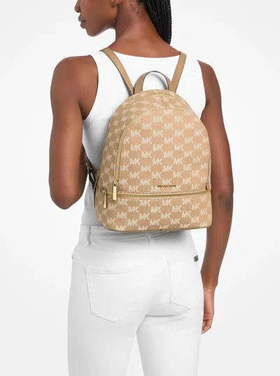 Michael Kors Outlet Rhea Medium Logo Jacquard Denim Backpack In Brown