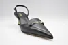 Michael Kors Pointed Toe Pumps With Ankle Strap And Gold Accent In Black