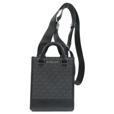 Pre-owned Michael Kors Pvc Handbag () In Black