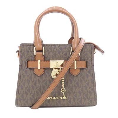Pre-owned Michael Kors Pvc Handbag () In Brown