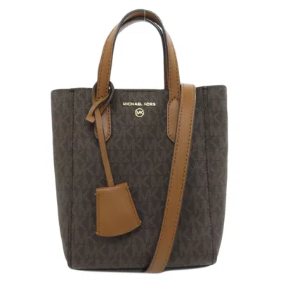 Pre-owned Michael Kors Pvc Handbag () In Brown