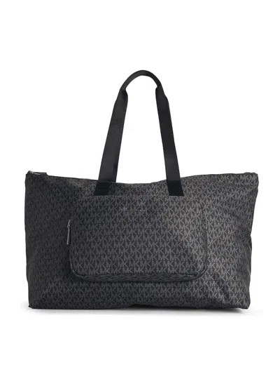 Michael Kors Tanner Large Reversible And Foldable Tote Bag In Black