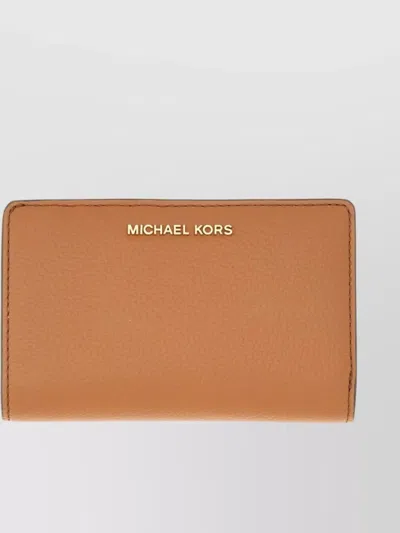 Michael Kors Textured Leather Fold-over Wallet In Brown