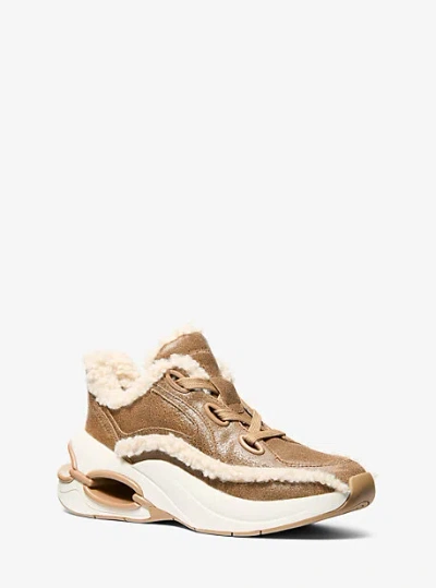 Michael Kors Toni Distressed Leather And Sherpa Trainer In Brown