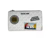 Michael Kors Women's Jet Set Travel Double Zip Wristlet Wallet In White In White