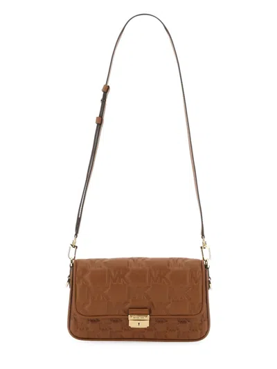 Michael Michael Kors Michael By Michael Kors Logo Handbag With Adjustable Shoulder Strap In Brown