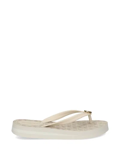 Michael Michael Kors Posie Logo Charm Flip Flops In Neutral