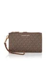 Michael Michael Kors Signature Print Wristlet Wallet In Brown