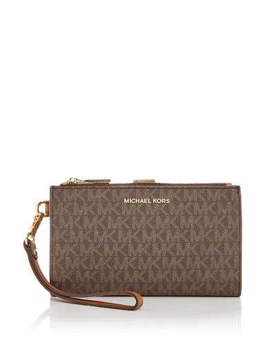 Michael Michael Kors Signature Print Wristlet Wallet In Brown
