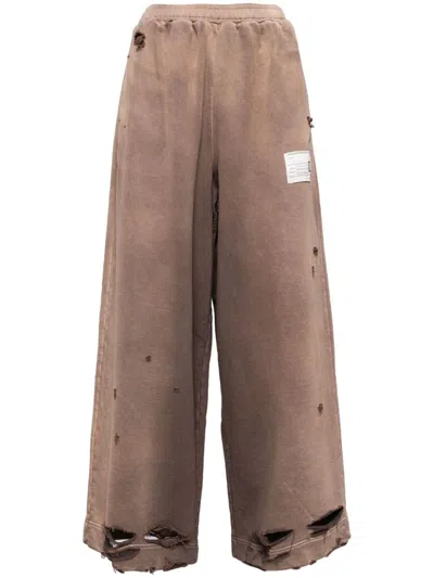 Miharayasuhiro Logo Patch Trousers In Brown