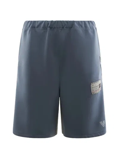 Miharayasuhiro Logo-patch Panelled Shorts In Blue