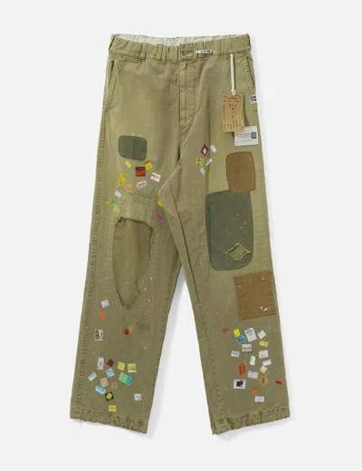 Miharayasuhiro Price Tag Sticker Print Repaired Pants In Green