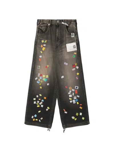 Miharayasuhiro Price Tag Sticker-printed Wide Denim Pants In Black