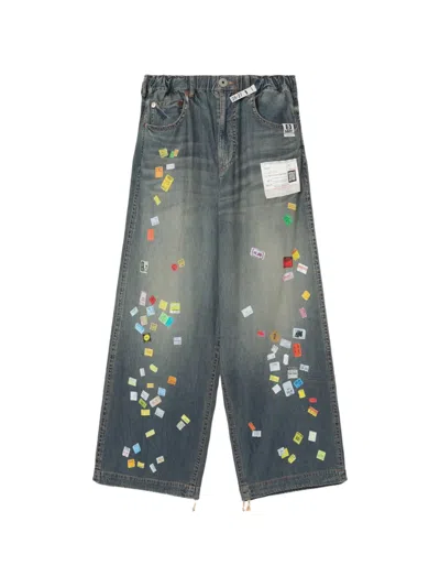 Miharayasuhiro Price Tag Sticker-printed Wide Denim Pants In Blue