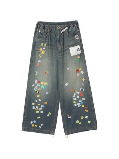 Miharayasuhiro Price-tag Sticker Printed Jeans In Black