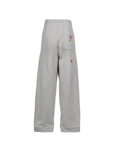 Miharayasuhiro Price-tag Sticker Printed Sweat Pants In Gray