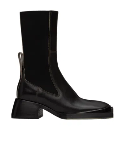 Miista Loose And Tight Spliced Short Boots In Black