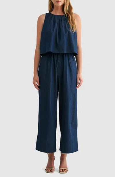 Mila Mae Sleeveless Popover Denim Jumpsuit In Blue