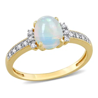 Mimi & Max 3/4 Ct Tgw Oval Shape Blue Ethiopian Opal And Diamond Accent Ring In 10k Yellow Gold