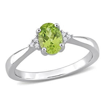 Mimi & Max 4/5ct Tgw Oval-cut Peridot And Diamond Accent Ring In Sterling Silver In Green
