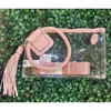 Mimi Wholesale Clear Wristlet With Cuff Handle & Tassel In Blush In Gold